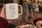 Simple black line art pet portrait mug with the name Purl shown beside the original dog